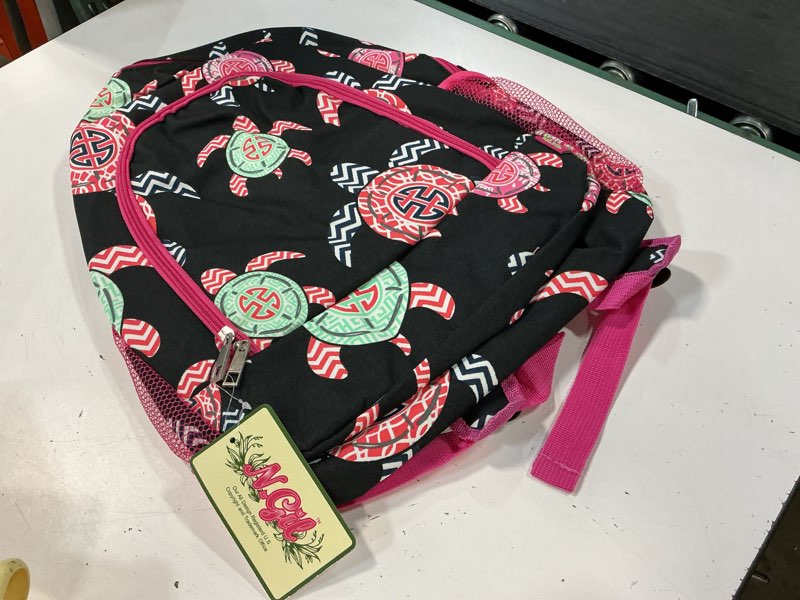Condition photo showing New/Like New for pink and black canvas sea turtle book backpack/bag