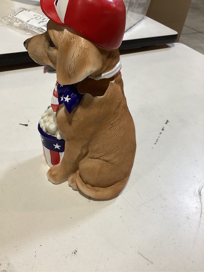 Condition photo showing As Is for fourth of july dog sculpture with popcorn