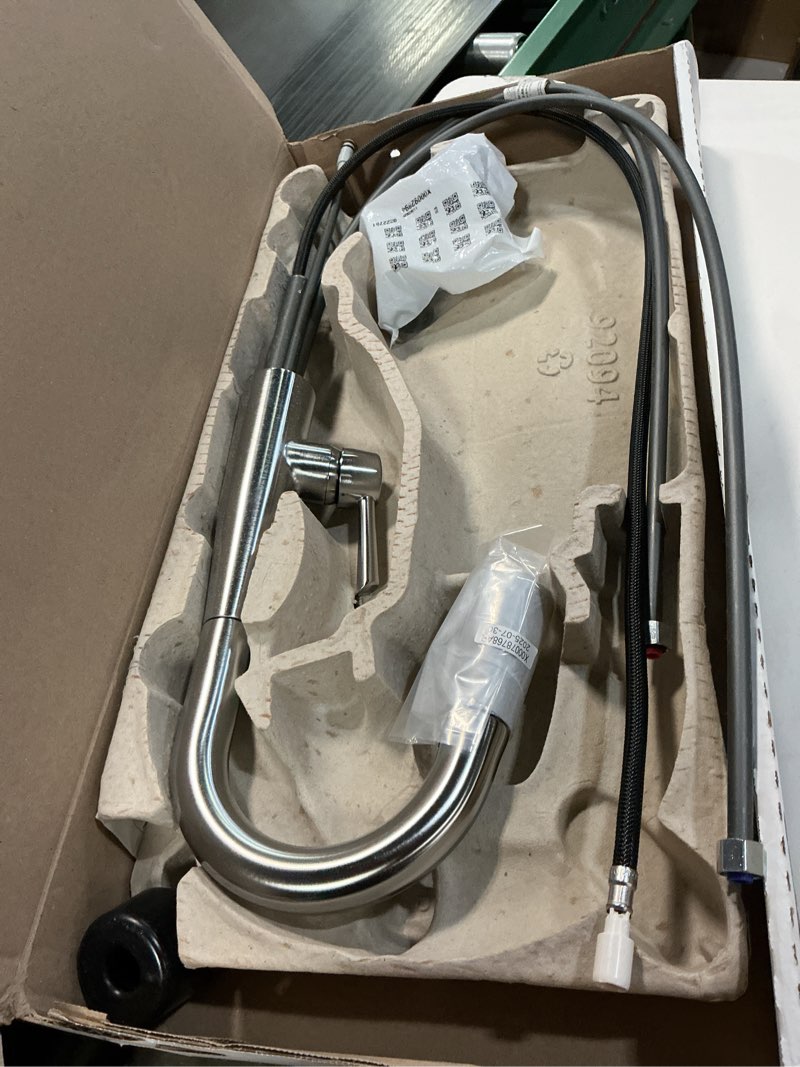 Condition photo showing As Is for Delta Essa Brushed Nickel Bar Sink Faucet with Pull Down Sprayer, Modern Single Hole Prep Sink Faucet, Single Handle, Arctic Stainless 9913-AR-DST Arctic Stainless Standard Activation