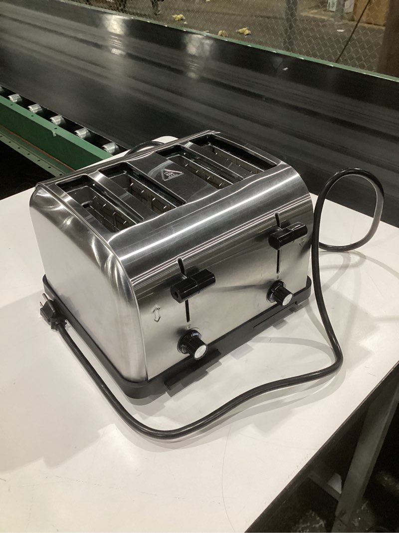 Condition photo showing Good Condition for waring (wct708) four-compartment pop-up toaster, silver classic