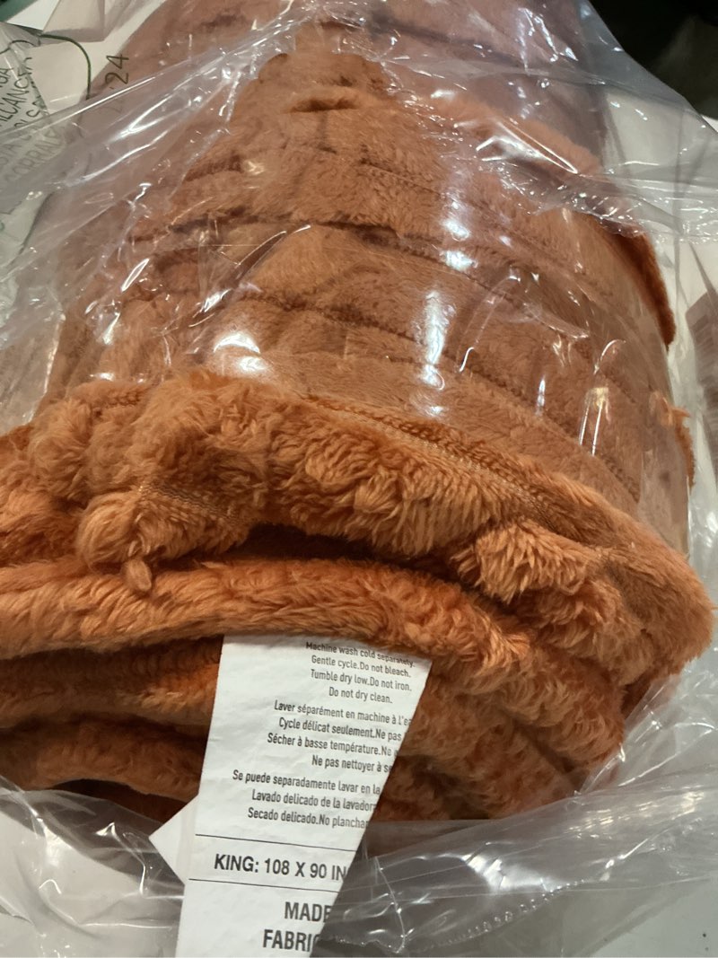 Condition photo showing Good Condition for BEDELITE Fleece Blanket King Size – 3D Ribbed Jacquard Soft and Warm Decorative Blankets – Cozy, Fuzzy, Fluffy, Plush Lightweight Throw Blankets for Couch, Bed, Sofa(Orange, 108x90 inches) Burnt Orange King(108"x90")