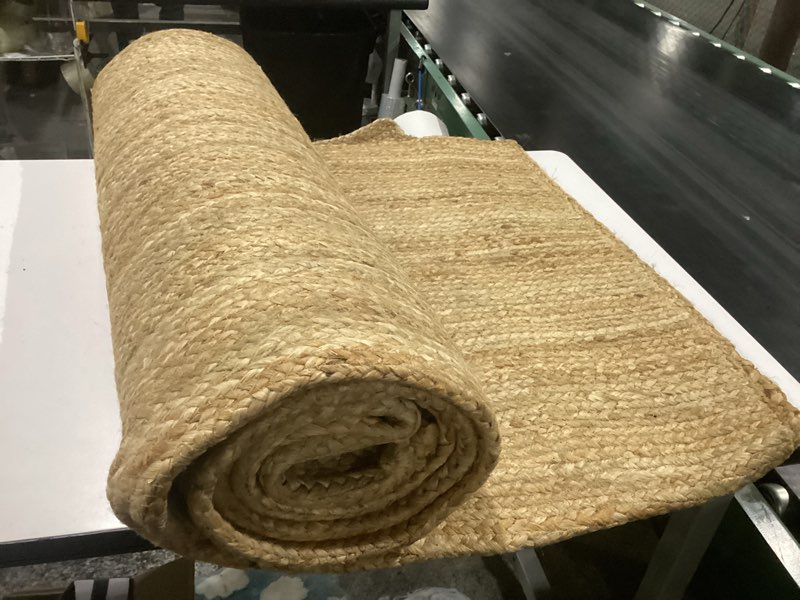 Condition photo showing Good Condition for hand braided large jute area rug - premium eco friendly natural fiber farmhouse style rugs for living room, bedroom, dinning room, hallway, office 8' x 10' (rectangular)