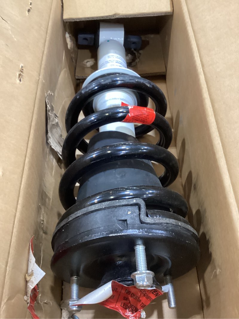 Condition photo showing As Is for rancho rs5000x loaded rs551830 suspension strut and coil spring assembly
