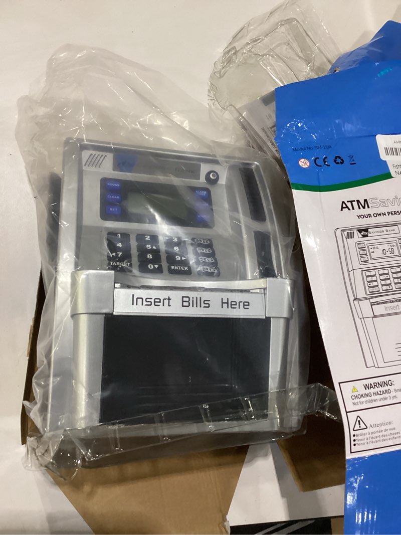 Condition photo showing New/Like New for fishboy atm piggy bank for kids with power-off memory and debit card for real money, onekey shutdown, coin recognition, target setting, bill feeder, balance calculator, savings machine box silver/black