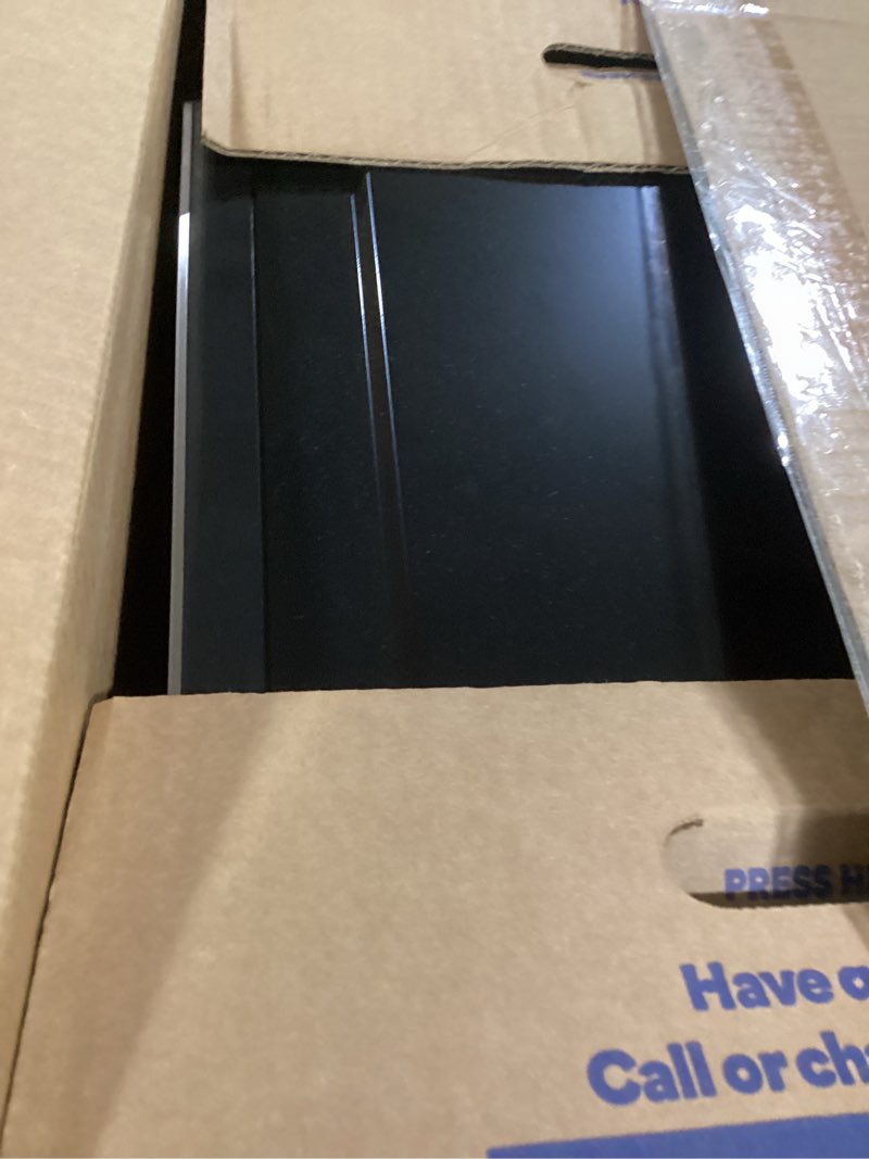 Condition photo showing Good Condition for Farberware 0.7 Cu. Ft. Countertop Microwave Oven – 700 Watts Power, Auto Cook Settings, Defrost, Easy Clean and Child Safety Lock - Stainless 0.7 Cu. Ft. Stainless Steel