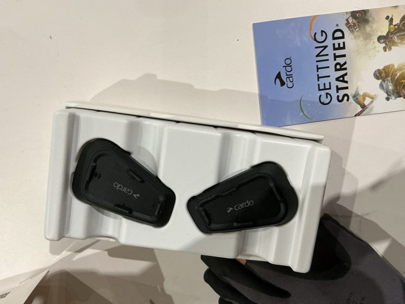Condition photo showing As Is for cardo spirit hd motorcycle bluetooth communication headset, connect up to 2 riders, fm radio - dual pack 2 pack spirit hd
