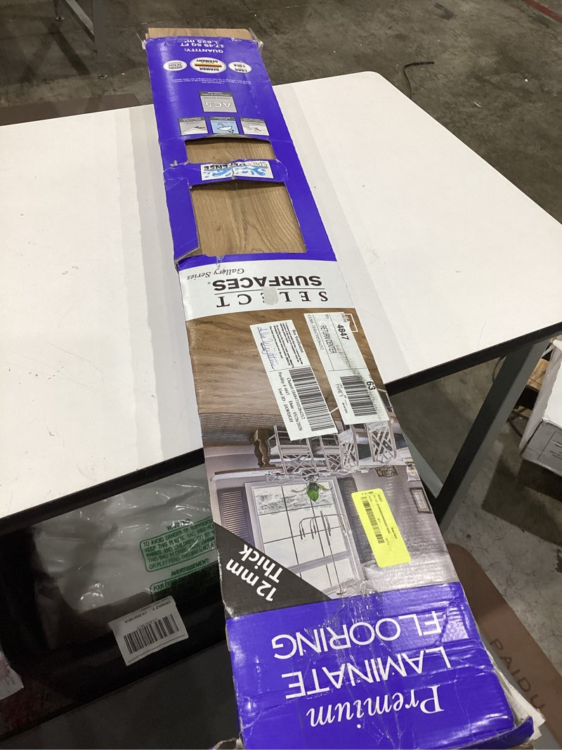 Condition photo showing Good Condition for select surfaces victoria spilldefense laminate flooring, 17.49 sq. ft. per box