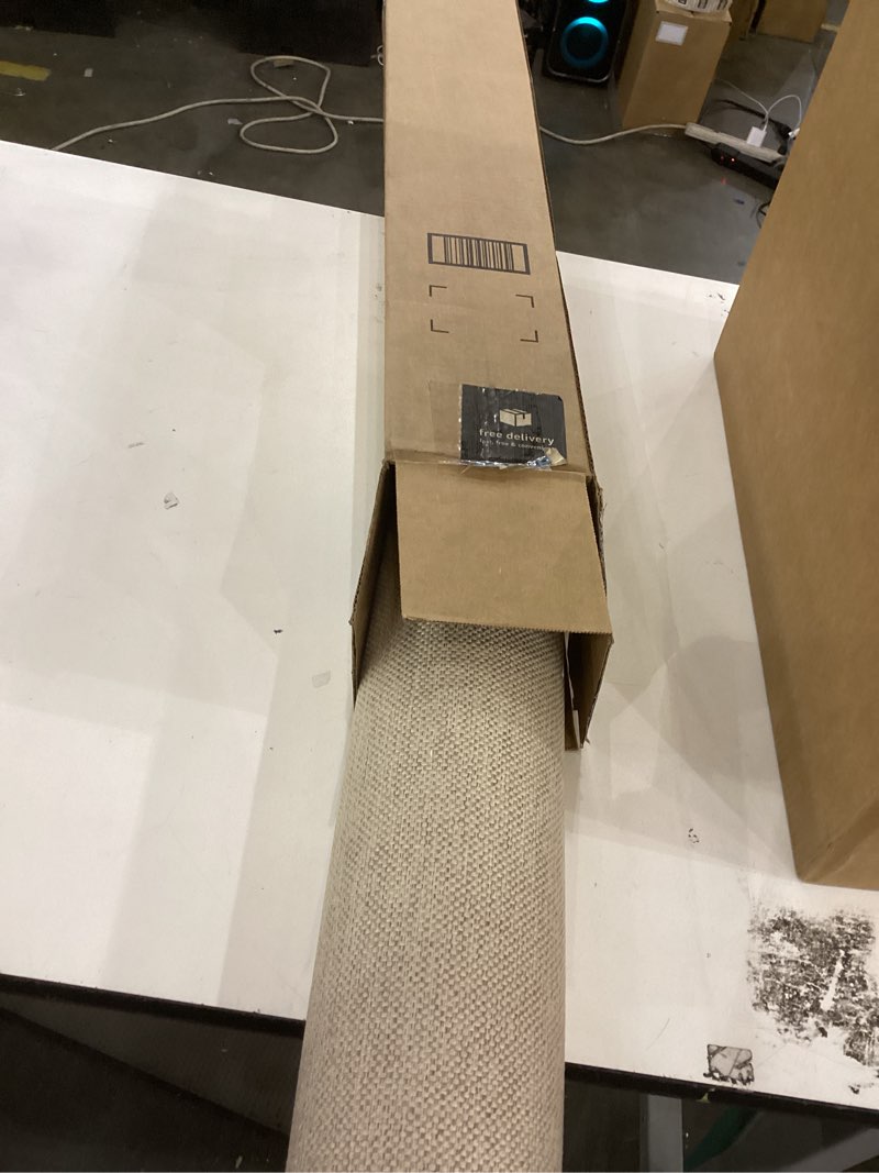 Condition photo showing As Is for Brown and black rug