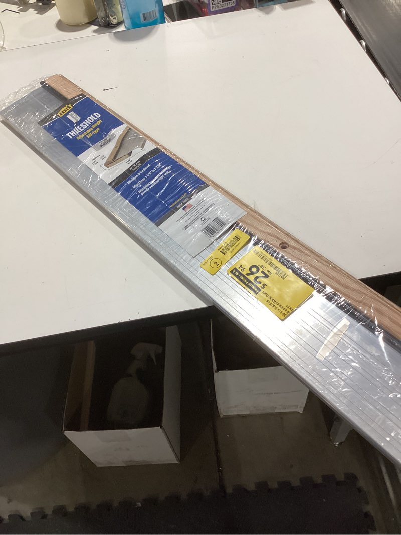 Condition photo showing Good Condition for m-d building products 1.13 in. h x 5.63 in. w x 36 in. l aluminum adjustable threshold oak
