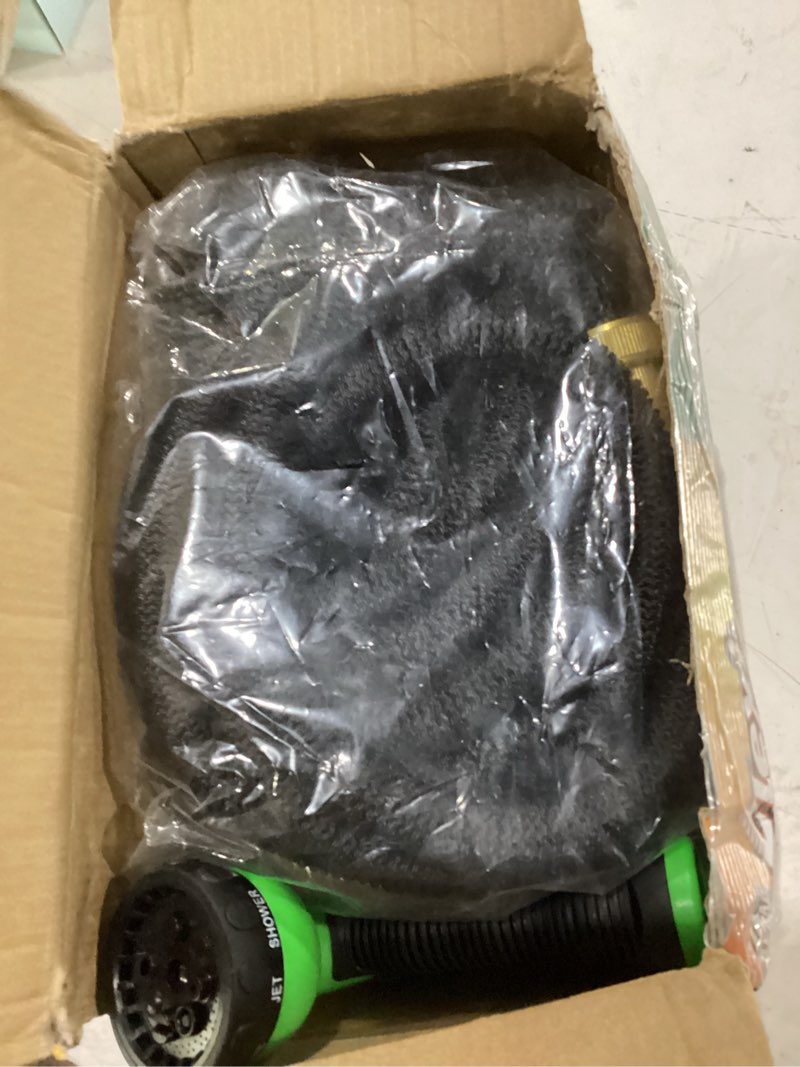 Condition photo showing New/Like New for flexi hose expandable garden hose with 8 function nozzle, 50ft - lightweight retractable garden hose, water hose - no-kink flexibility, 3/4 inch solid brass fittings and double latex core 50ft black