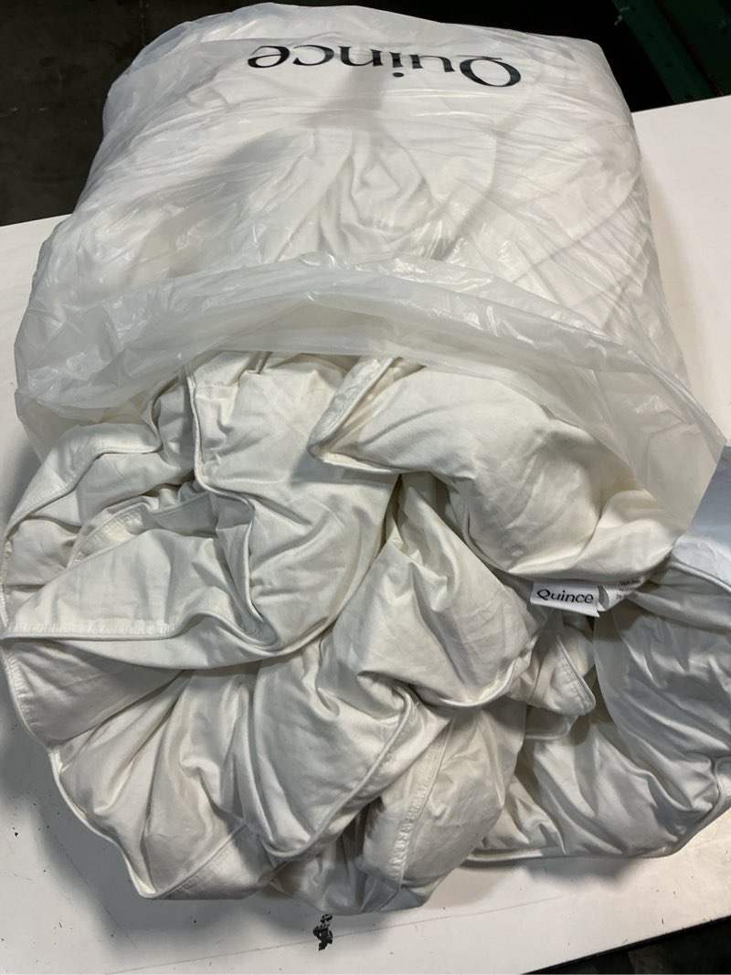 Condition photo showing As Is for quince premium down comforter, king/cal king, down