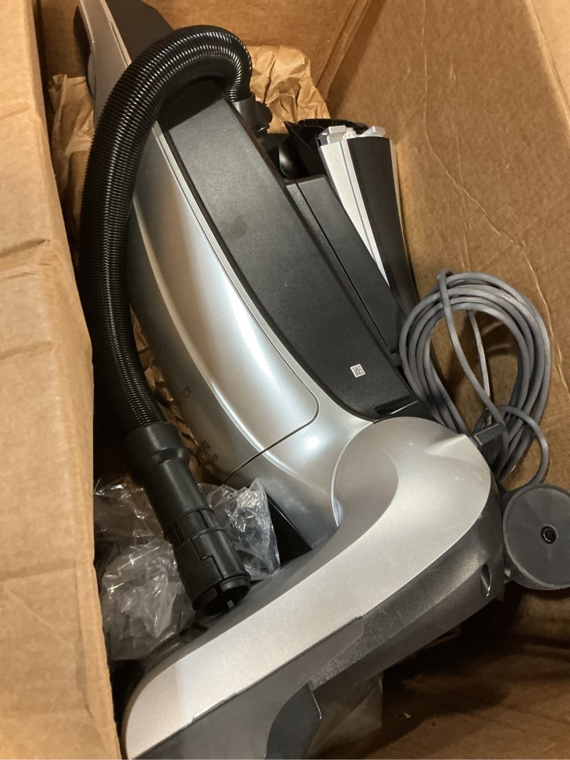 Condition photo showing As Is for Kenmore Elite 31150 Pet Friendly Bagged Upright Beltless Vacuum w/Pet Handi-Mate, Triple HEPA, 3D Inducer Motor, Telescoping Wand, 5-Position Height Adjustment, 3 Cleaning Tools-Silver Carpet & Bare Floors Beltless