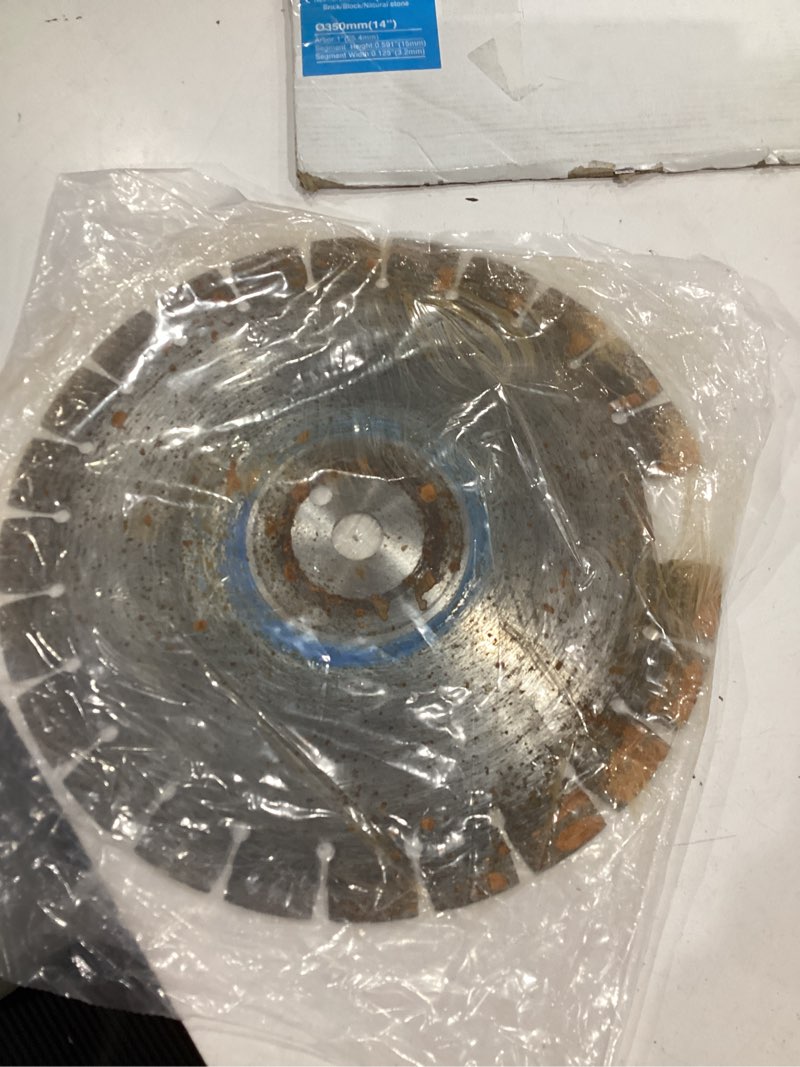 Condition photo showing As Is for 3/8 in. green concrete diamond saw blade for early entry cutting - soft bond