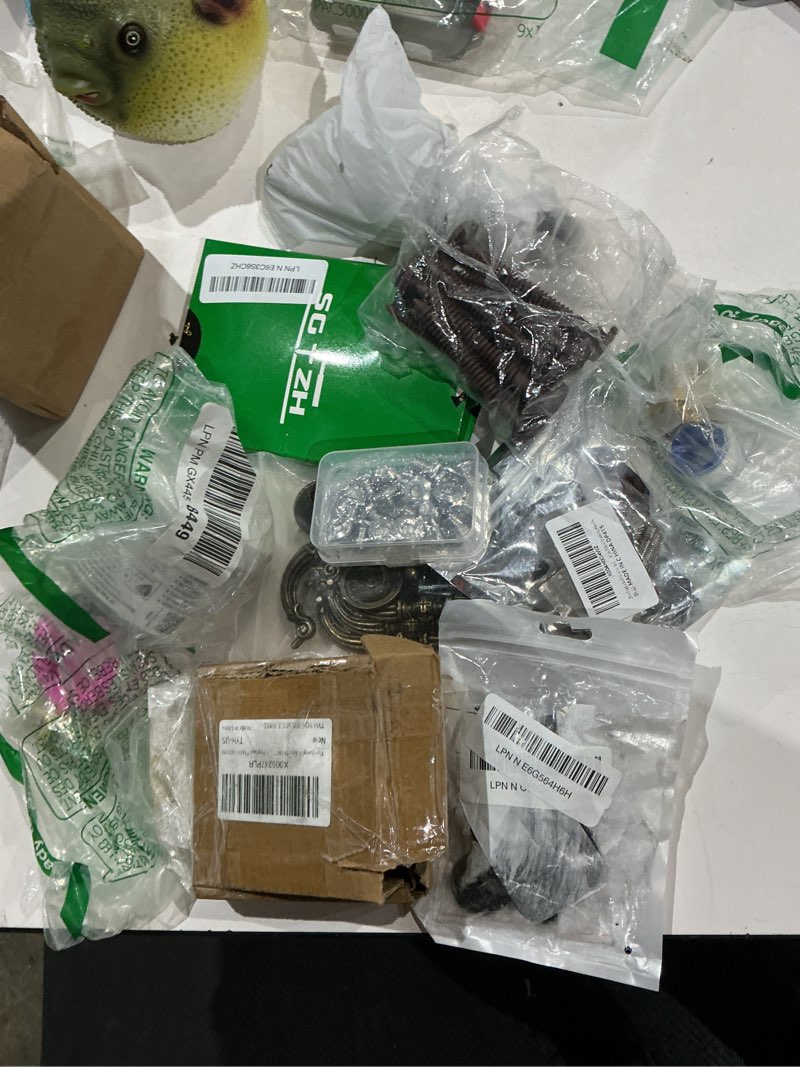 Condition photo showing As Is for assorted home improvement lot (small tools, screw, home accessories, etc.)