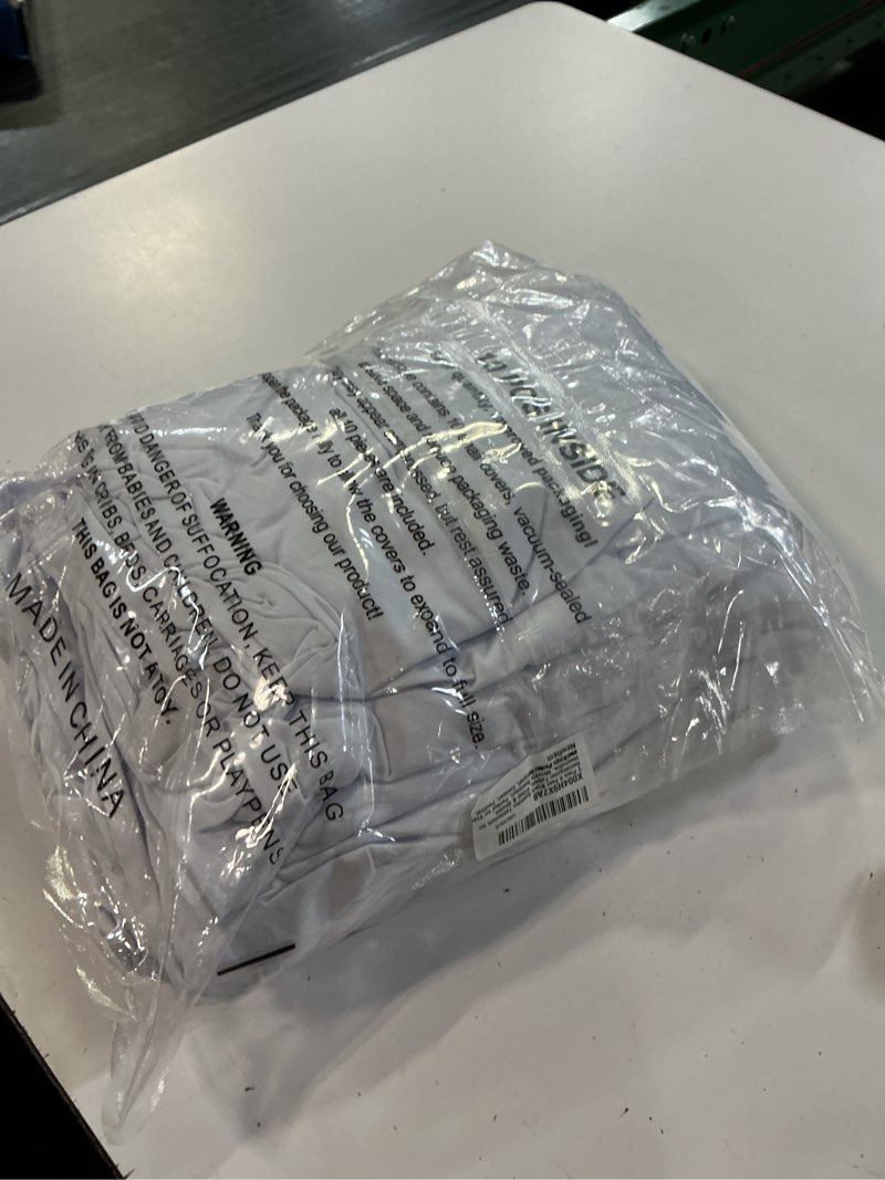 Condition photo showing Good Condition for (the color is white)2 pack 6 feet black spandex tablecloth for rectangular tables, fitted & stretch, washable, wrinkle resistant, perfect for event, wedding, party, banquet, cocktail, festival, and table protector 6 feet - 2 pack black