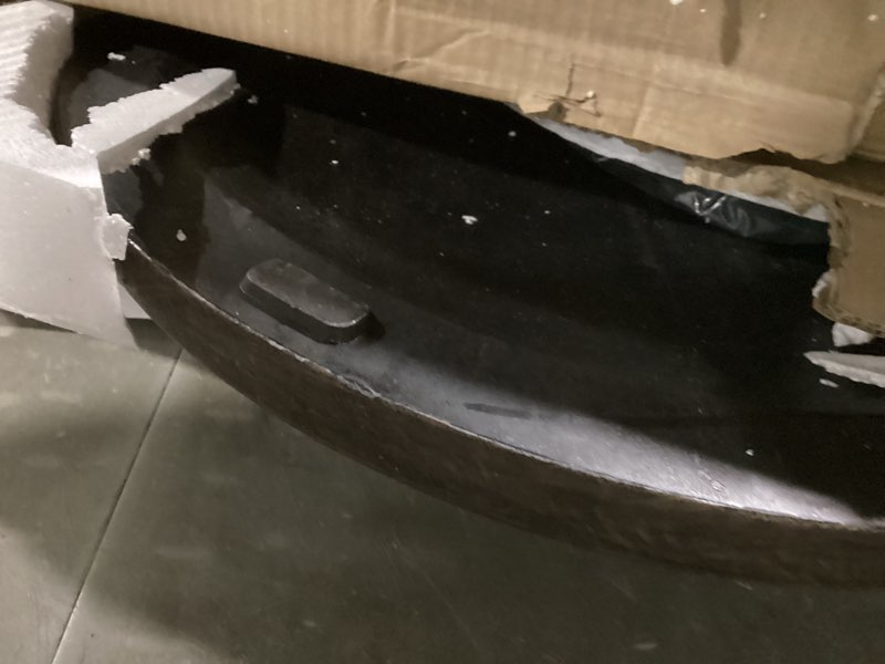 Condition photo showing As Is for ubp24241-br 24-inch cast stone umbrella base, made from rust free composite materials, bronze powder coated finish 24"