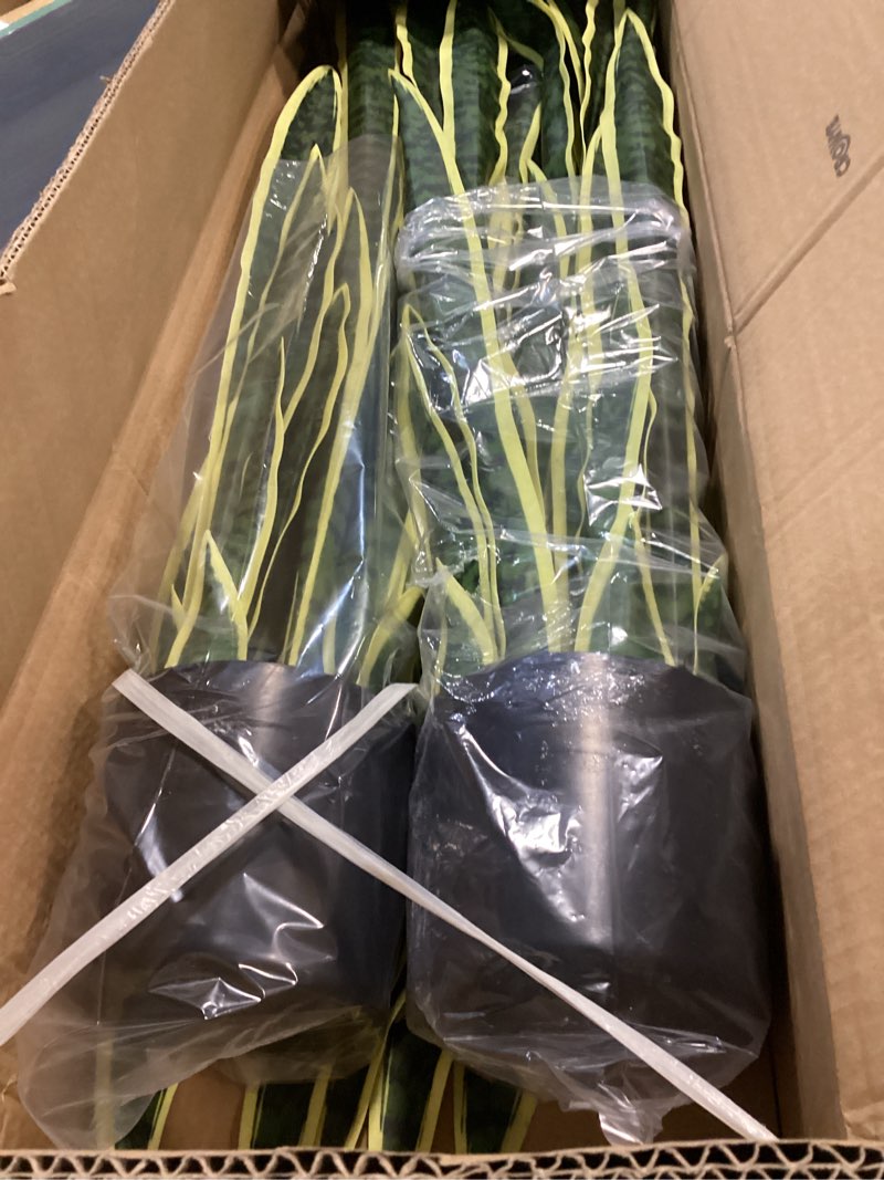 Condition photo showing Good Condition for crowye 4 pack 3.15 ft tall artificial snake plant faux sansevieria plant large fake snake bulk in pot for home office housewarming gift 4 38 inch