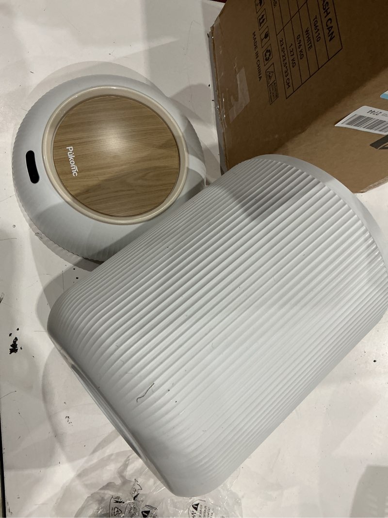 Condition photo showing As Is for pukomc smart sensor wastebasket, convenient and hygienic easy to use, technology sensor waterproof wastebasket plastic trash can for kitchen, bathroom, bedroom, living room, office and outdoor 1 pack white