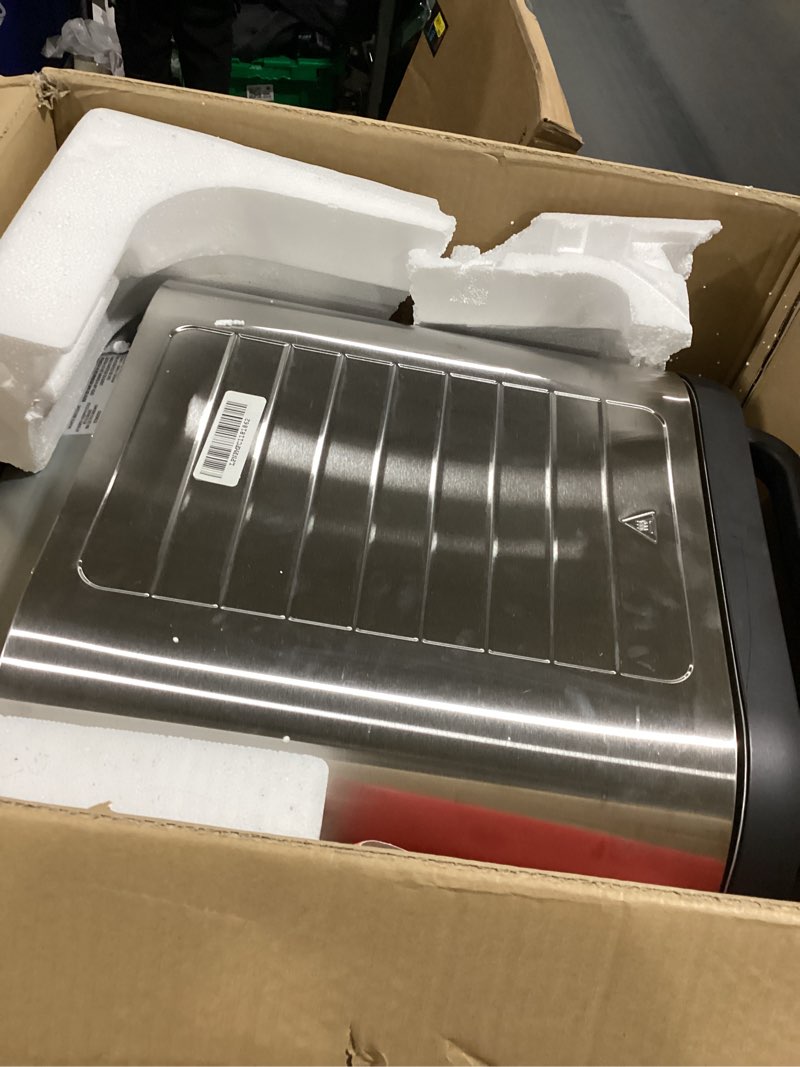 Condition photo showing item condition for Gourmia Indoor Pizza Oven Air Fryer Toaster – 1800W Countertop Multi-Cooker with Pizza Stone, Digital Controls & 6 Presets, Stainless Steel