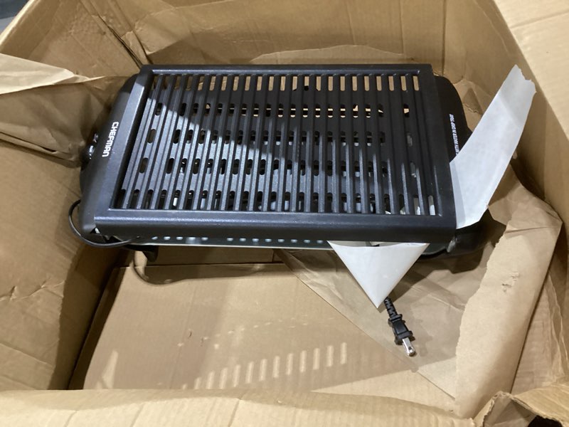 Condition photo showing As Is for chefman electric smokeless indoor grill w/ non-stick cooking surface & adjustable temperature knob from warm to sear for customized bbqing, dishwasher safe removable water tray, black, not tested