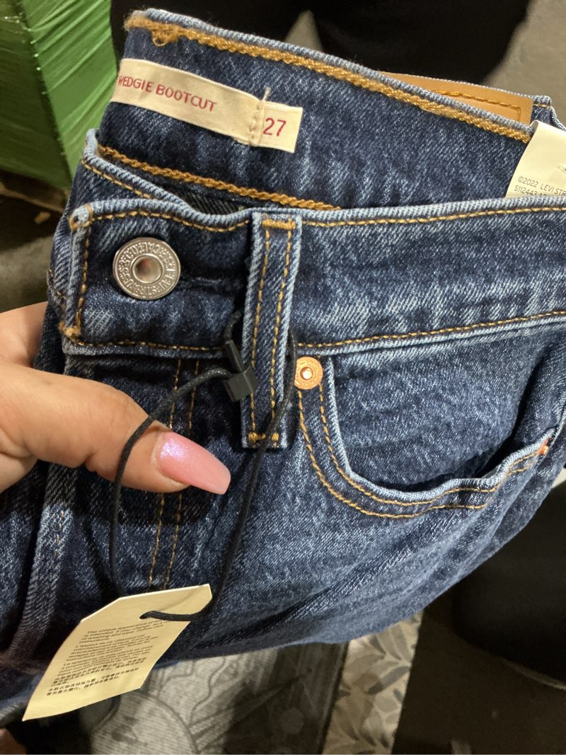 Condition photo showing New/Like New for levi's women's wedgie boot 27w x 32l bold and beautiful