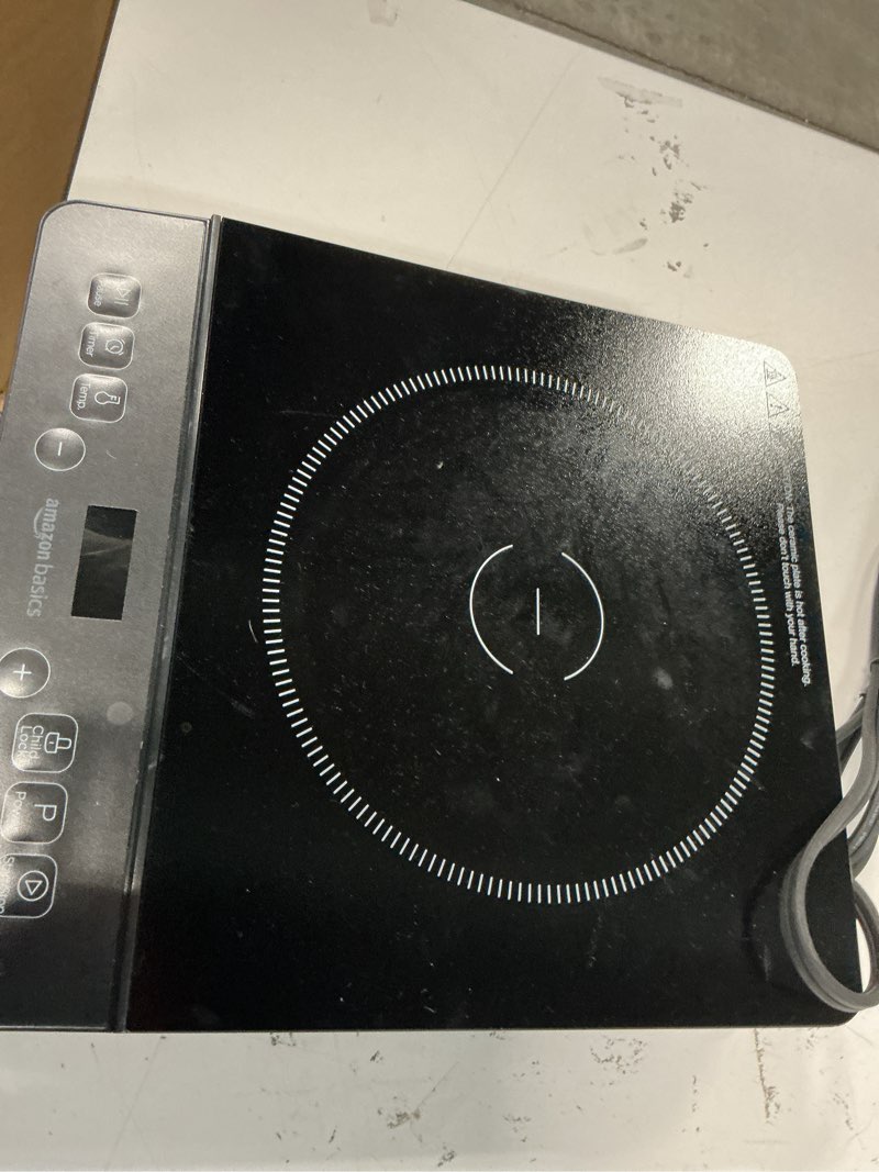 Condition photo showing As Is for Steelite DWELINPC 15 Inch Induction Range Cordless Black Countertop 1 Burner - 1/Case(similar)