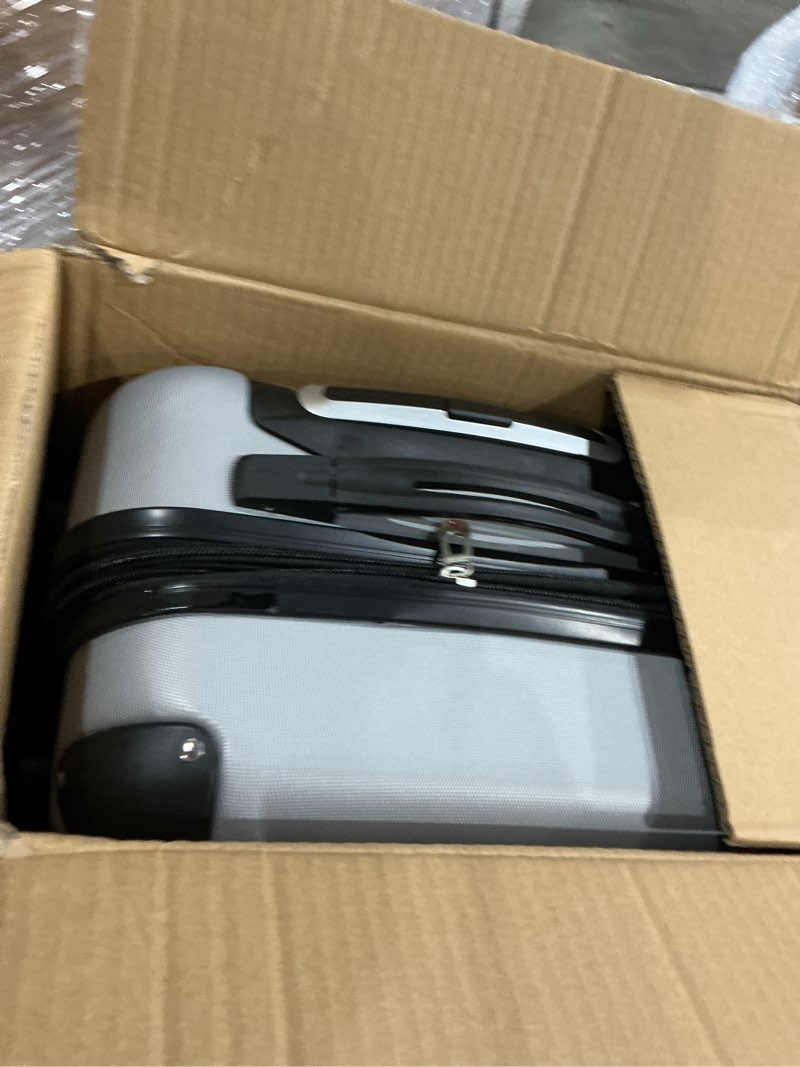 Condition photo showing New/Like New for travelers club chicago hardside expandable spinner luggage, silver, 22" carry-on 22" carry-on silver