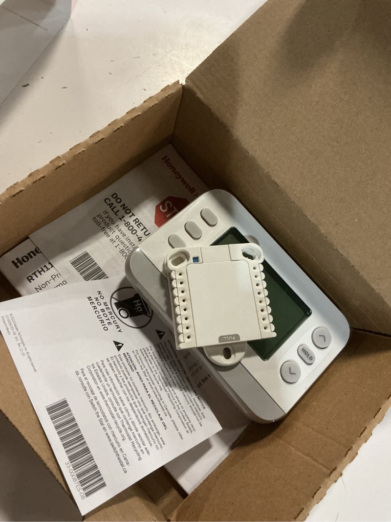 Condition photo showing As Is for horizontal non-programmable thermostat