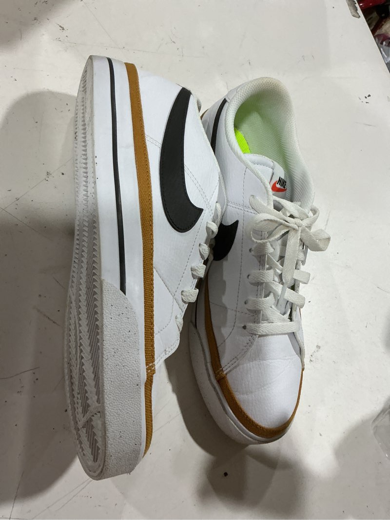 Condition photo showing As Is for nike tennis court legacy next nature for women