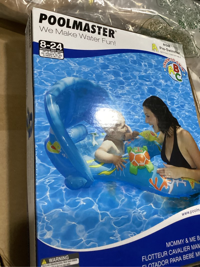 Condition photo showing New/Like New for poolmaster mommy & me baby pool float with sun shade, infant and toddler swim float for ages 8–24 months, dual ring shared swim design with drop seat for comfort and safety 1 child