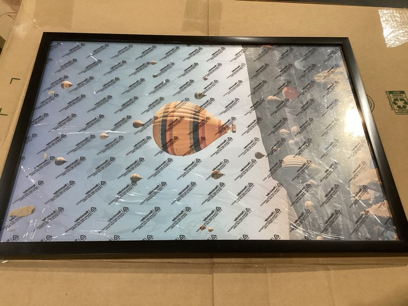 Condition photo showing As Is for 15x21 picture frame for wall display, 15x21 black picture frame with shatter resistant plexiglass, stable and sturdy 15 x 21 poster frame for wall display, handpicked gift collection, 1 pack