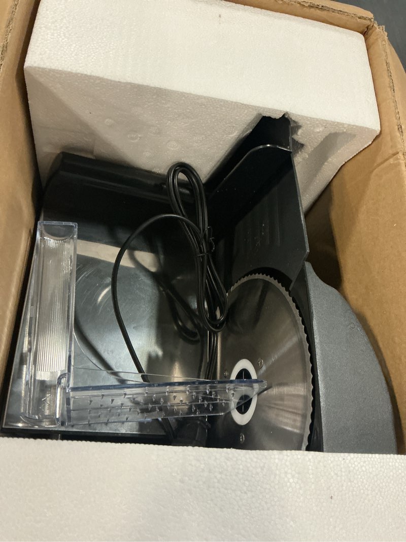 Condition photo showing As Is for elite gourmet emt-625b ultimate precision electric deli food meat slicer removable stainless steel blade, adjustable thickness, ideal for cold cuts, hard cheese, vegetables & bread, 7.5”, black stainless steel & black