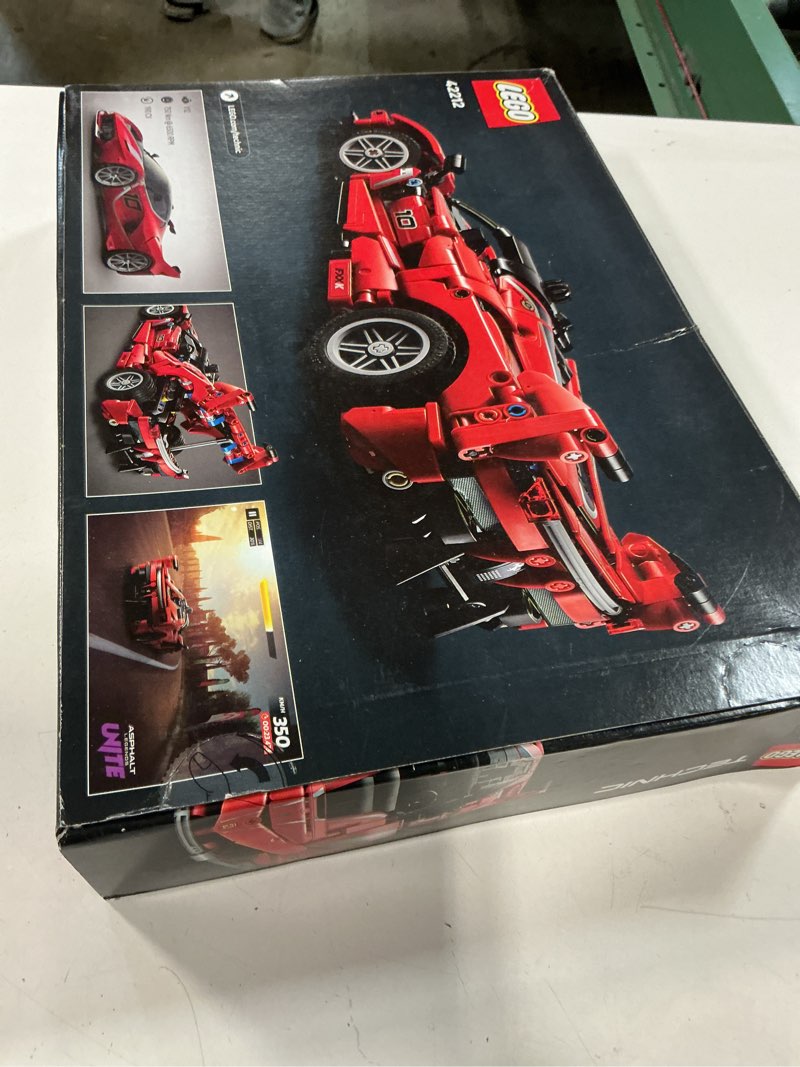 Condition photo showing New/Like New for LEGO Technic Ferrari FXX K Toy Car - Building Toy for Girls & Boys, Ages 10+ - Cool Birthday Gift for Kids - Race Car Model for Play & Display - 42212