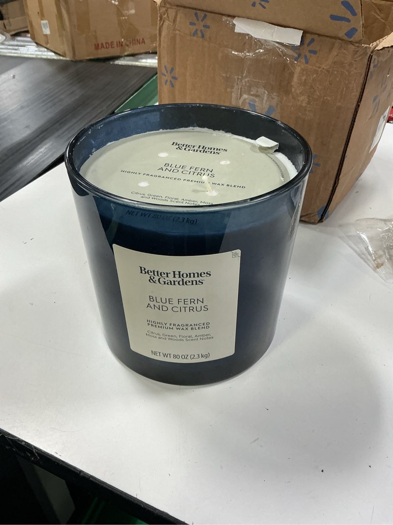 Condition photo showing Good Condition for better homes & gardens blue fern & citrus scented 4-wick large oversized jar candle 80oz.