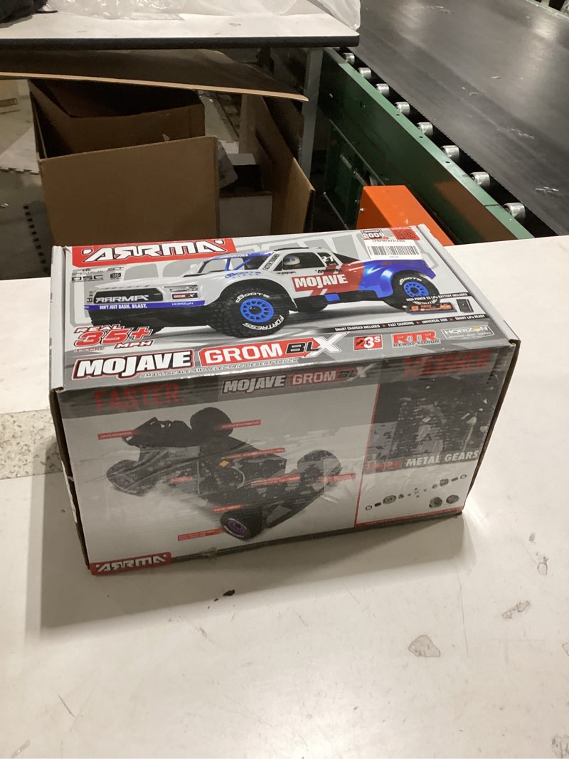 Condition photo showing New/Like New for ARRMA RC Truck Mojave GROM 4X4 223S BLX BRUSHLESS Small Scale Desert Truck RTR with DSC, Battery & Charger Included, Teal, ARA2304ST1