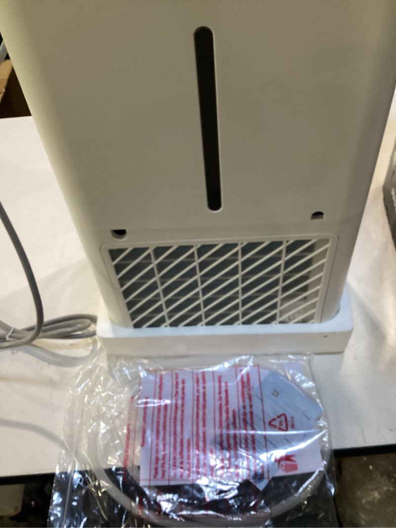 Condition photo showing New/Like New for freaire 54pint dehumidifier for 4500sq.ft, compressor dehumidifiers for home, front humidity value display&quiet dehumidifier for basement, bedroom, bathroom, with drain hose, 1.13 gallon water tank