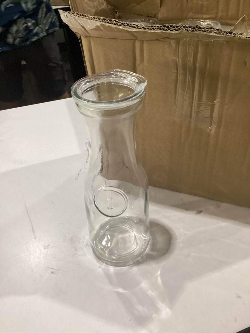 Condition photo showing Good Condition for netany set of 4 glass carafe with lid, 1 liter beverage serveware carafe, clear glass pitcher for mimosa bar, brunch, cold water, juice, milk, iced tea, lemonade