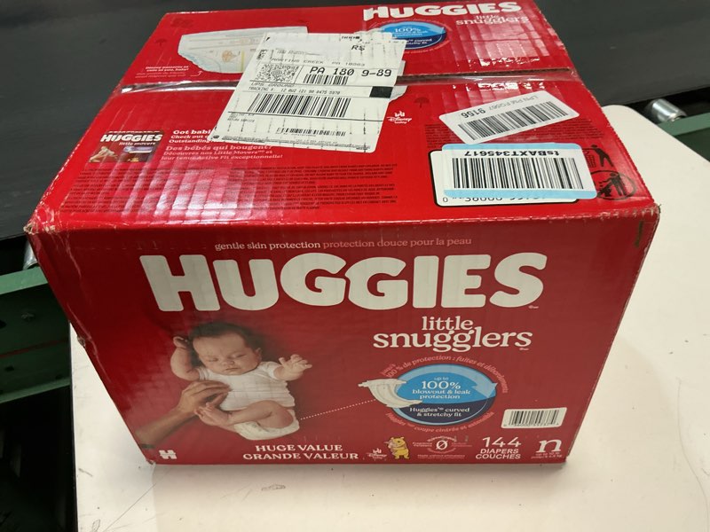 Condition photo showing item condition for Huggies Size Newborn Diapers, Little Snugglers Baby Diapers, Size Newborn (up to 10 lbs), 144 Count, Packaging May Vary