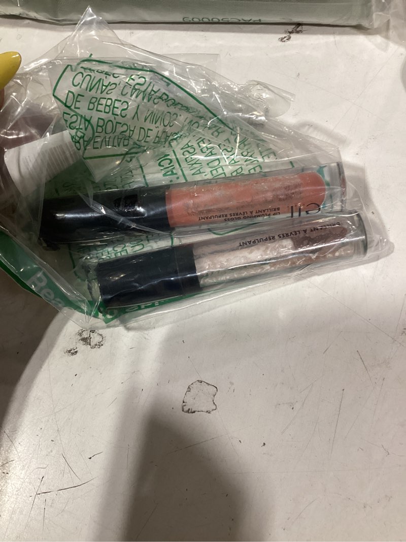 Condition photo showing As Is for e.l.f. lip plumping gloss, high-shine sheer color, hydrates & creates fuller lips with vitamin e, vegan & cruelty-free, pink cosmo