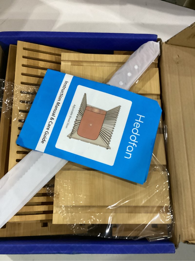 Condition photo showing New/Like New for bamboo bread slicer for homemade bread - built-in knife slot, crumb catcher & storage compartment - adjustable extra wide & high for sourdough - long 12” knife blade included