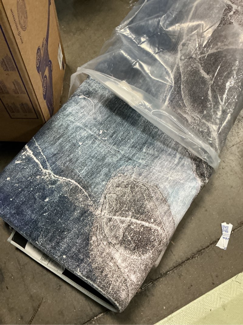 Condition photo showing As Is for dalyn rugs odyssey oy3 blue 9' x 12' soft luxury microfiber washable indoor area rug, easy clean, non shedding, living room rug