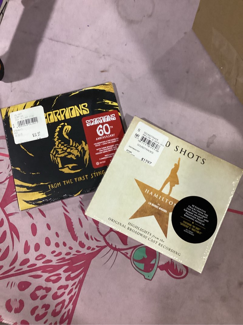 Condition photo showing New/Like New for assorted music cd’s