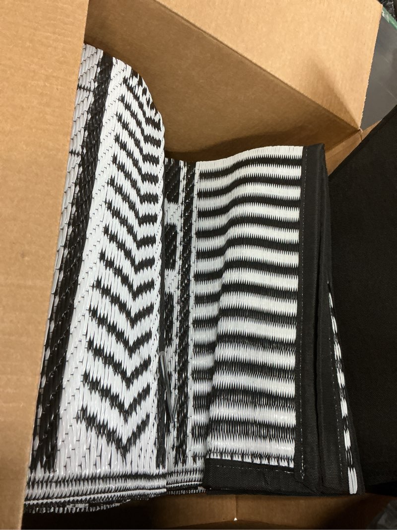 Condition photo showing Good Condition for waterproof outdoor rug 5x8ft, boho reversible plastic straw mat for patio rv deck porch backyard balcony camping picnic beach indoor outdoor carpet, black&white boho (black&white) 5 x 8 feet