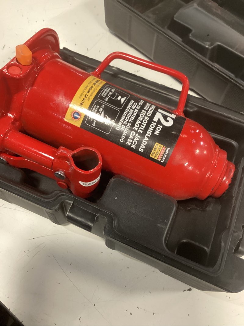 Condition photo showing As Is for big red 12 ton (24,000 lb) hydraulic bottle jack with carrying case?red 12ton