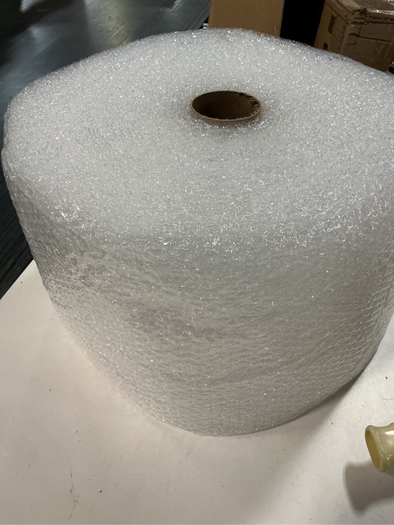 Condition photo showing As Is for yens bubble wrap 700ft x 12" clear plastic, 3/16" small bubble, perforated every 12", 4 rolls x 175ft each, made in usa