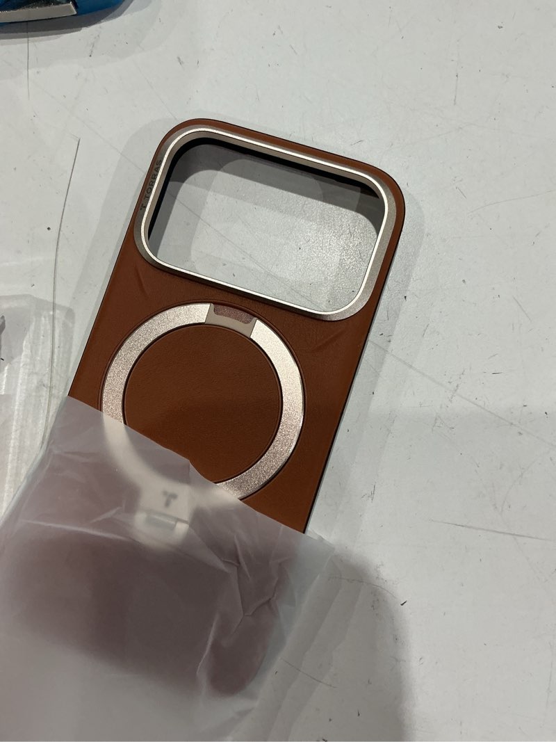 Condition photo showing Good Condition for torras organic leather for iphone 17 pro case with stand, fit for magsafe, 360 spin stand with camera control, premium leather durable stylish q3 vegskin for iphone 17 pro phone case, saddle brown saddle brown for iphone 17 pro 6.3''