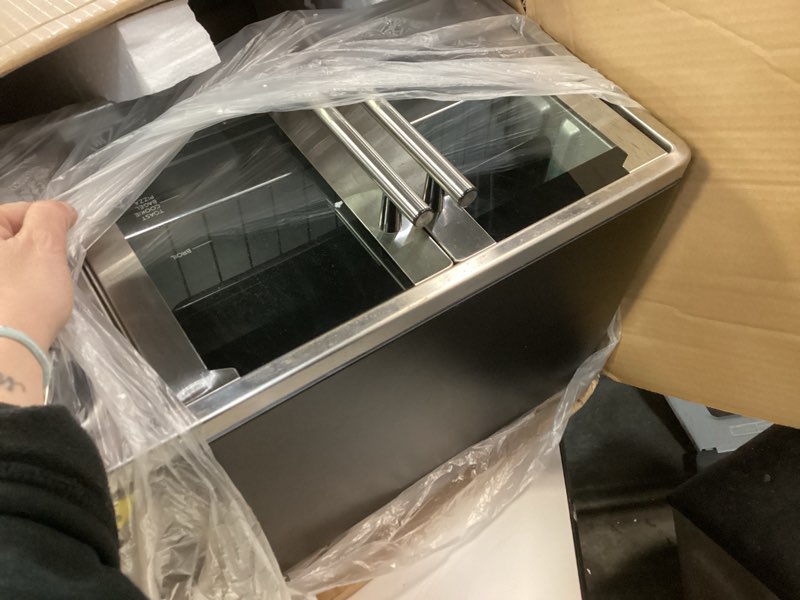 Condition photo showing As Is for Elite Gourmet ETO2530M New Double French Door Toaster Oven fits 12  Pizza  Stainless Steel