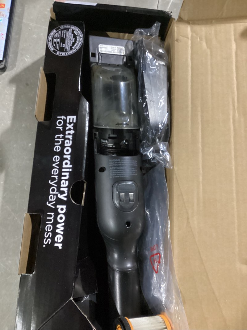 Condition photo showing As Is for shark wv201 wandvac handheld vacuum, lightweight at 1.4 pounds with powerful suction, charging dock, single touch empty and detachable dust cup,graphite, slate
