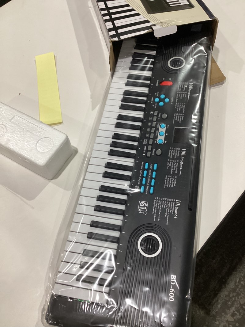 Condition photo showing New/Like New for 61 keys keyboard piano, Electronic Digital Piano with Built-In Speaker Microphone, Portable Keyboard Gift Teaching for Beginners, electric piano for kids Black