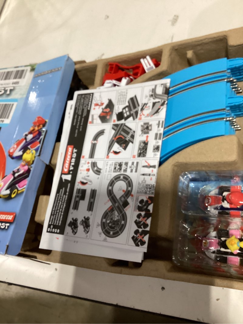 Condition photo showing Good Condition for Carrera First Nintendo Mario Kart Slot Car Race Track - Includes 2 Cars: Mario and Yoshi - Battery-Powered Beginner Toy Racing Set for Kids Ages 3 Years and Up